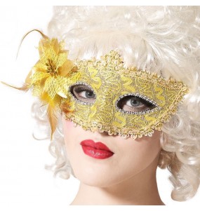 Máscara veneziana cor de ouro com flor para completar o seu disfarce